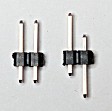 Time for the MUSB switch now. Take a 2-pin header (left), and push the pins through to give the result shown on the right.